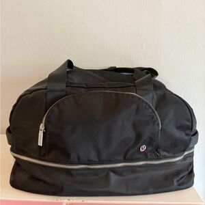 Lululemon Athletica Black Duffel Bag with Sporty Design-used only once